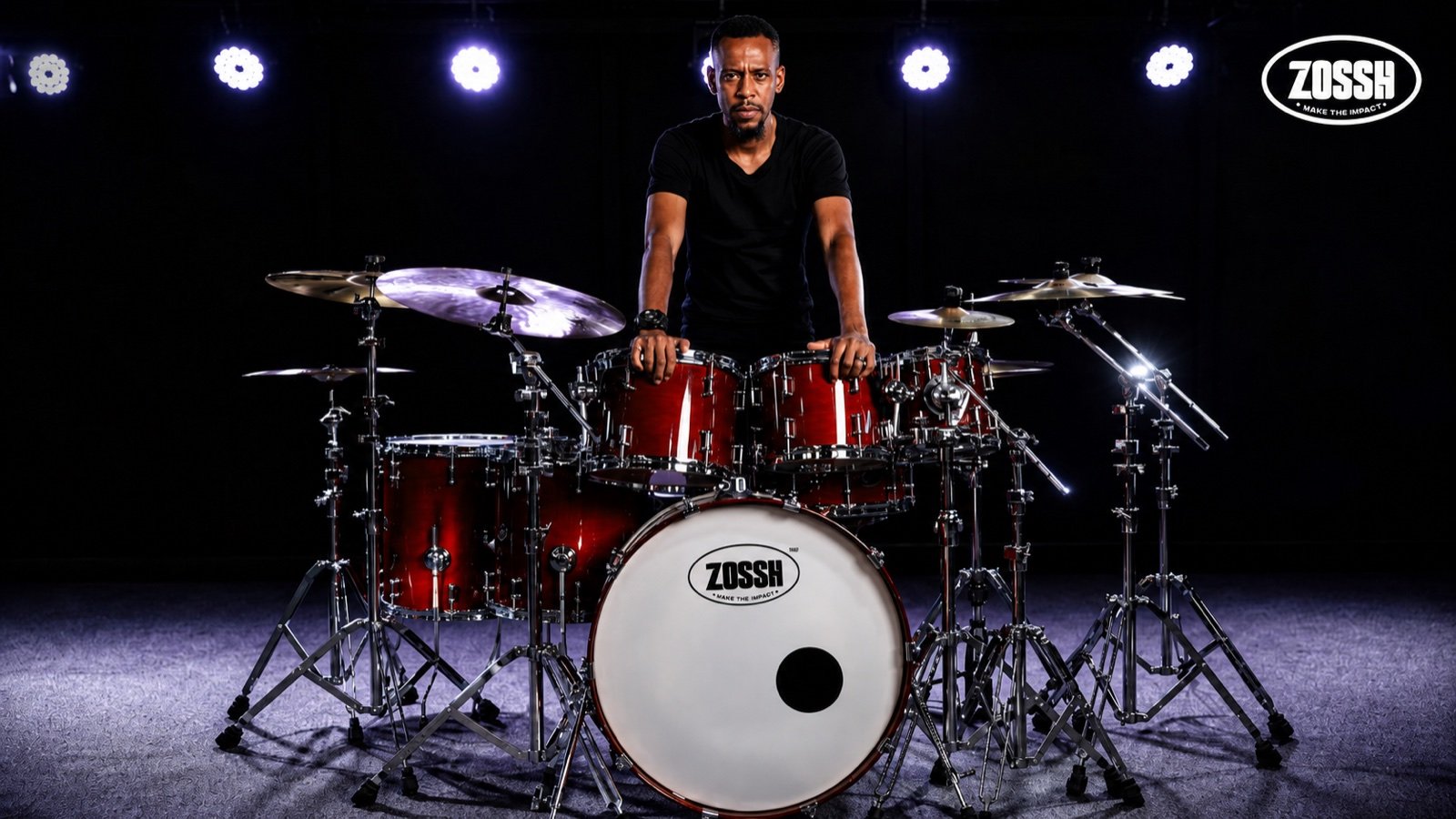 A drummer performing on a ZOSSH kit