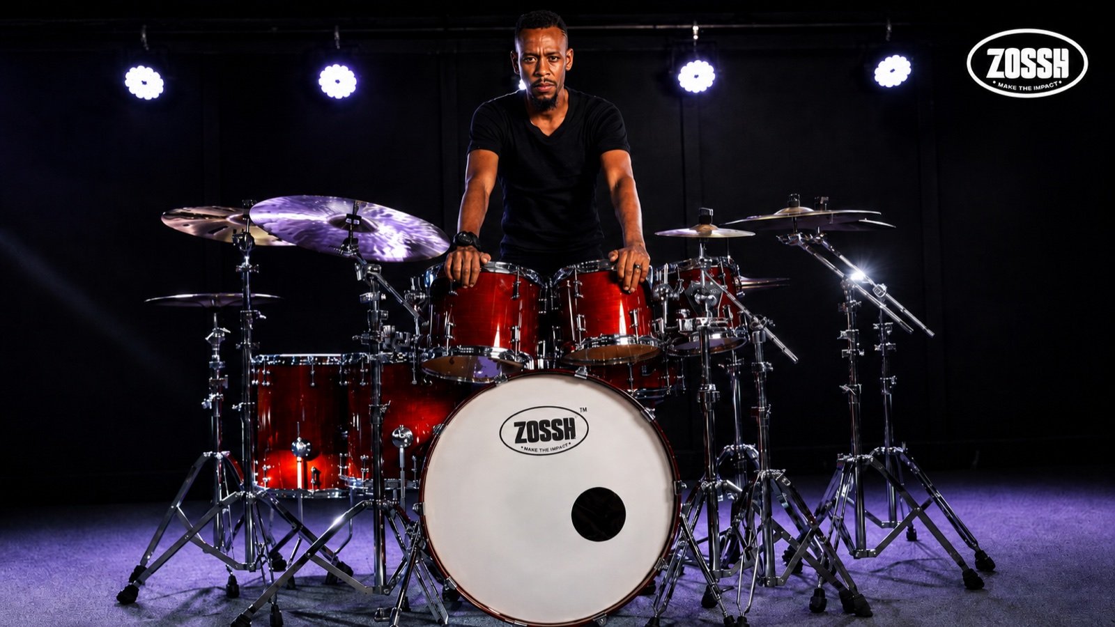 A drummer performing on a ZOSSH kit